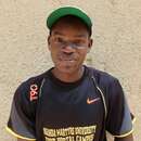 A young man with a green cap