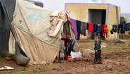 2020-winterhilfe-syrien-kinder-camp-welthungerhilfe.JPG Two boys in a refugee camp in Idlib.