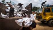 Hakimpara refugee camp in Bangladesh: Local NGO FIVDB distributes sacks with charcoal and rice husk pellets to Rohingya refugees (August 2018).