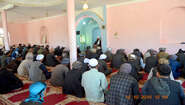Religious leader speaks to men at mosque in Afghanistan Religious leader speaks to men at mosque in Afghanistan
