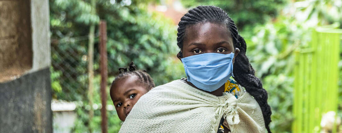 A woman with a face mask