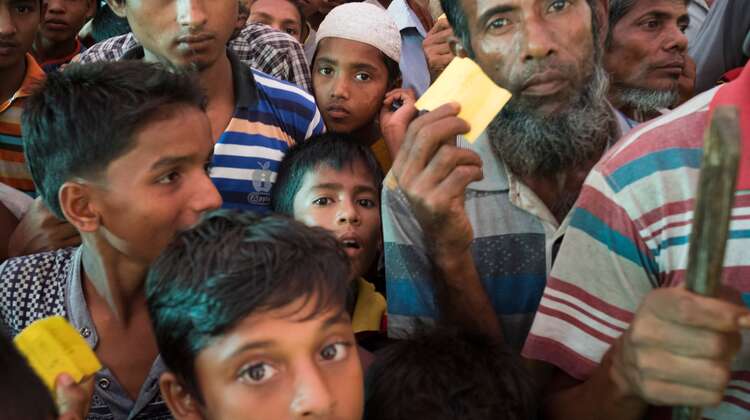 Rohingya at a fuel distribution in camp Hakimpara, Bangladesh, August 2018. 