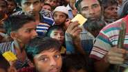 Rohingya at a fuel distribution in camp Hakimpara, Bangladesh, August 2018. 