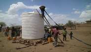 Lorries transport the huge water tanks to dry areas for use by the residents.