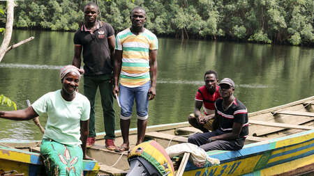 The Gbawleh family with their new boat