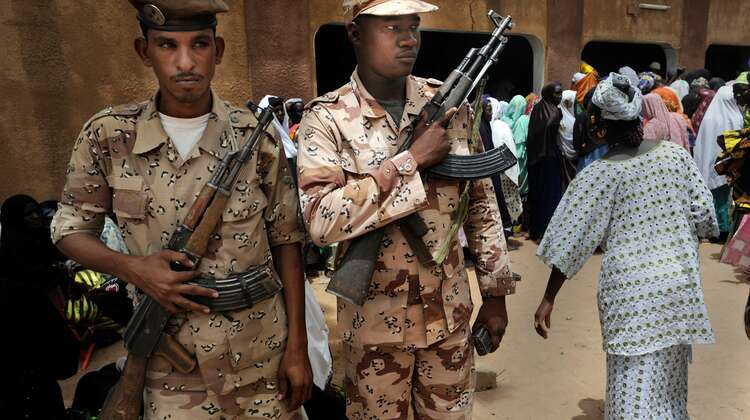 Soldiers secure cash withdrawals in the Kayes region of Mali (2012). 