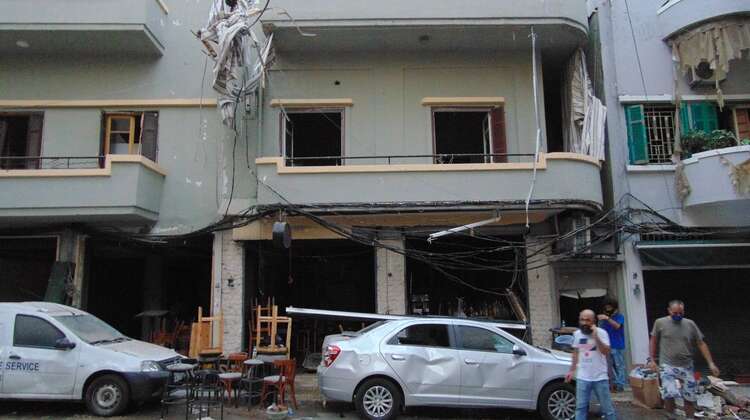 The wall of the houses is destroyed after the huge explosion at the harbour.
