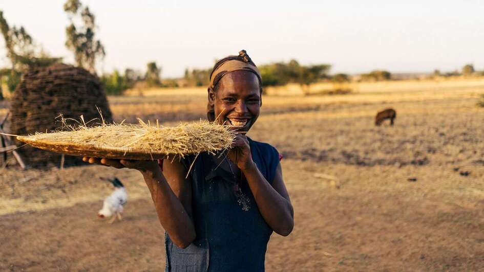 Smiling woman in the village of Sodo