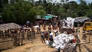 Hakimpara refugee camp in Bangladesh: Local NGO FIVDB distributes sacks with charcoal and rice husk pellets to Rohingya refugees (August 2018).