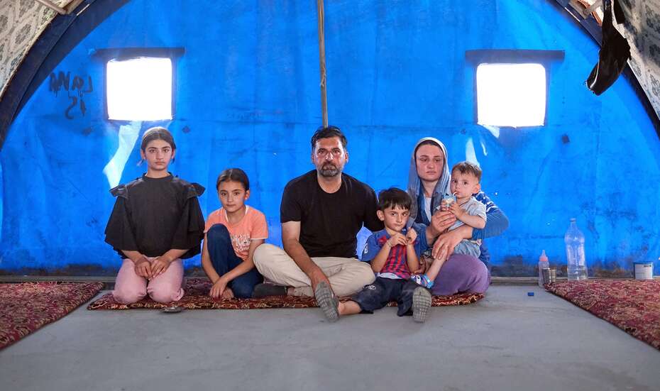 Murad and Khalida, alongside their children in Sinjar District, Ninewa