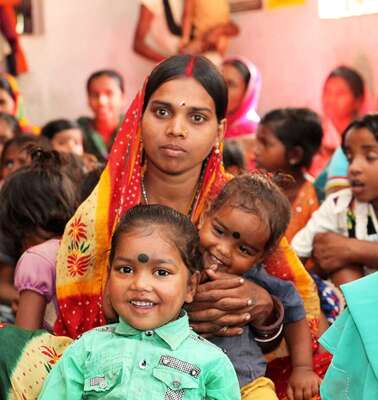A women with her two children.